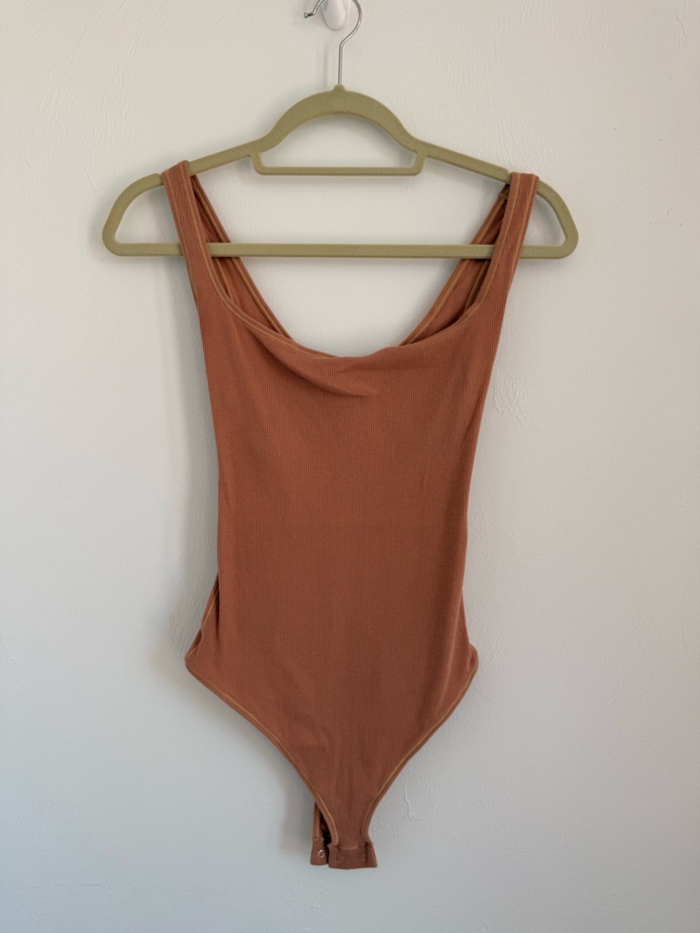 SKIMS Kids Ribbed One-Piece Bodysuit in Rust Brown